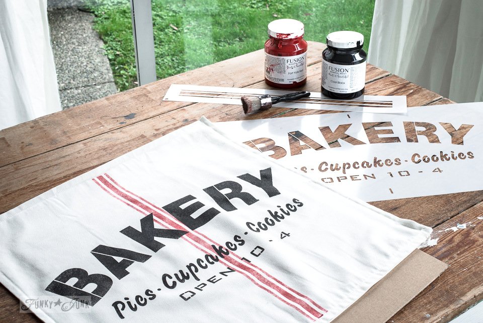Love the look of vintage grain sacks? Here’s one sweet way to make your own using stencils! Tutorial at:  goo.gl/fb/DthSVp  <a href="/FusionPaint/">Fusion Mineral Paint</a> <a href="/oldsignstencils/">Funky Junk's Old Sign Stencils</a> #oldsignstencils #funkyjunkinteriors #fusionmineralpaint #pillow #vintage #Bakery #Ikea #pillowTalk