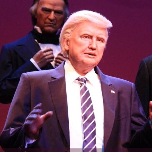 To me, it looks like Disney had already built the 'President Hillary' bot...and saved money by simply sticking a different wig on top...