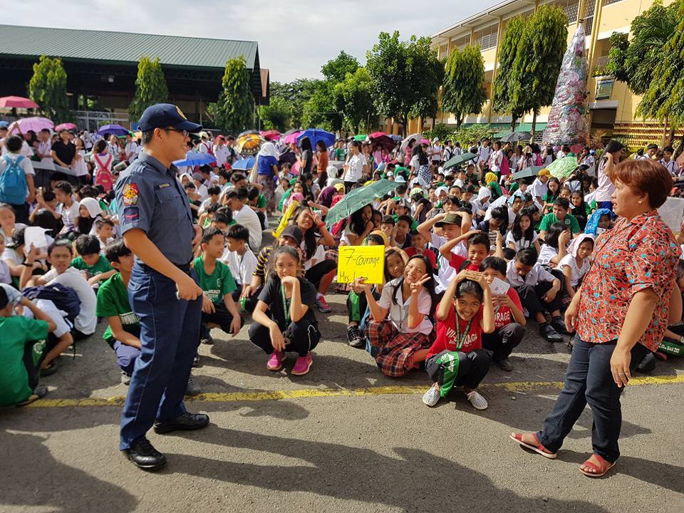 PS6QCPD's tweet photo. PCR personnel joined the faculty and students of Commonwealth High School in the conduct of Nationwide Simultaneous Earthquake Drill at the school's open ground, Ecol St., Brgy Commonwealth, Quezon City. https://t.co/TIB78Cq6PQ