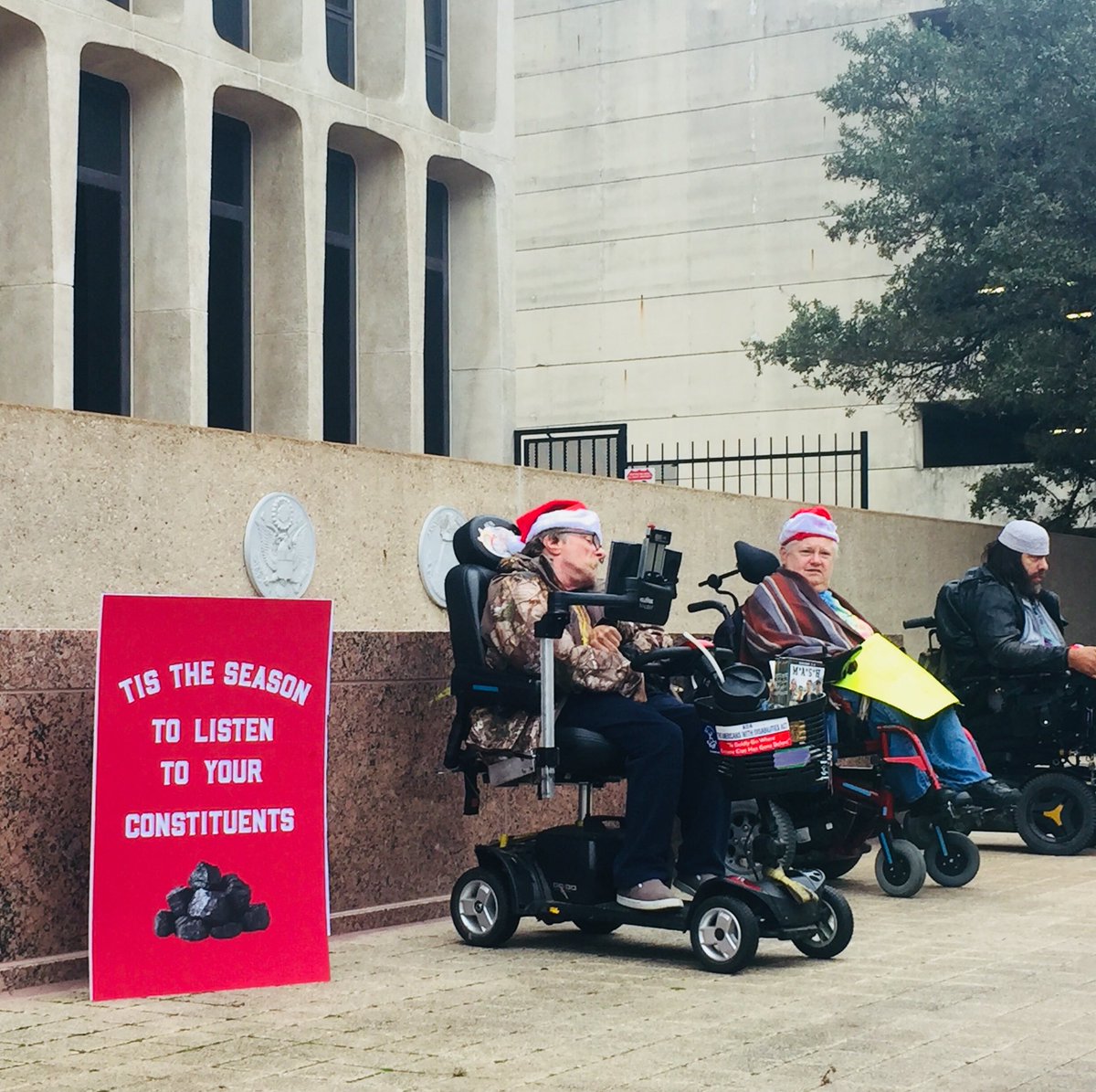 TexasSierraClub's tweet photo. Today, we delivered coal to @tedcruz and then made our way to @JohnCornyn’s office to give him some. Congress is on the naughty list this year for the #GOPTaxScam and delaying a #CleanDreamAct (along with many other grievances) #SantaResists #atx https://t.co/bkmmoto7o9