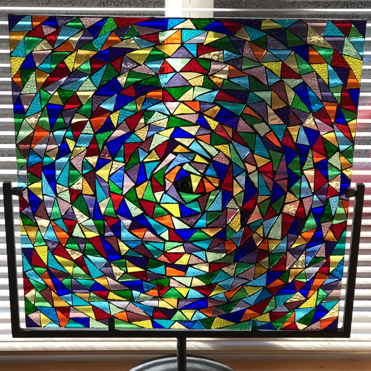 I could stare at this for hours...who needs twinkly lights?! #handmade #glass #colour #kaleidoscope #homedecor #commission