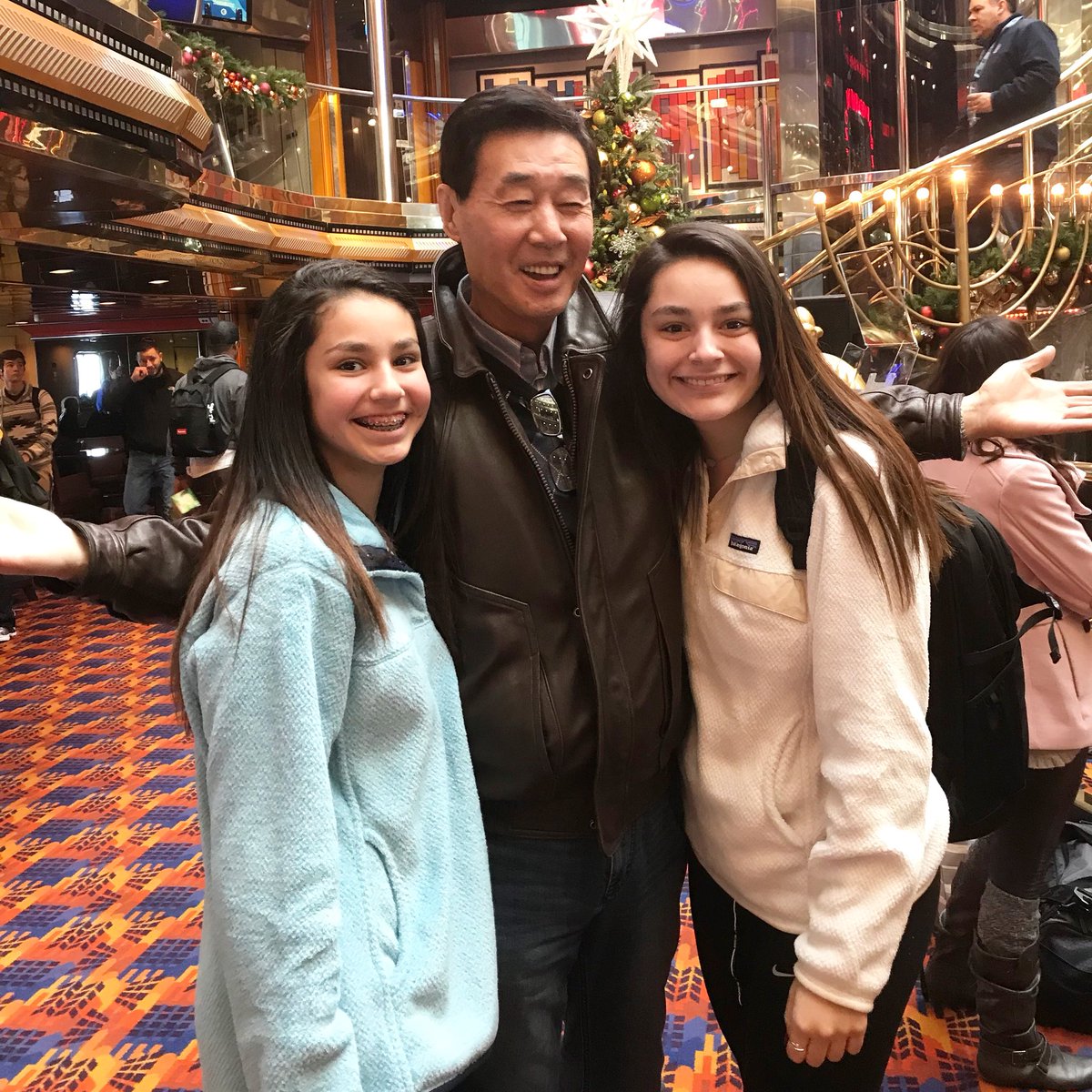 NCAcademyVB's tweet photo. Coach Li saw a couple familiar faces as he boarded his cruise this morning. We hope you all get to relax during the break like Coach Li will! #happyholidays #ncvba #goacademy #coacheslife #vballneverstops https://t.co/y59NZD7MBv