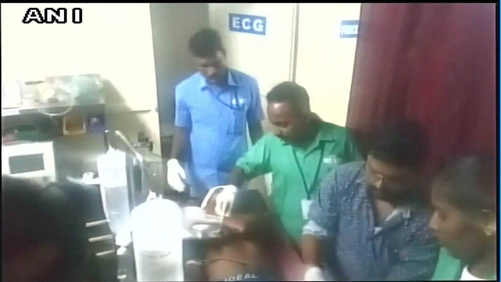 ANI's tweet photo. #Visuals from Kerala: An RSS worker critically injured after being attacked by a group of unidentified men in Kannur's Kathiroor earlier this evening. https://t.co/EvILwO1KtE