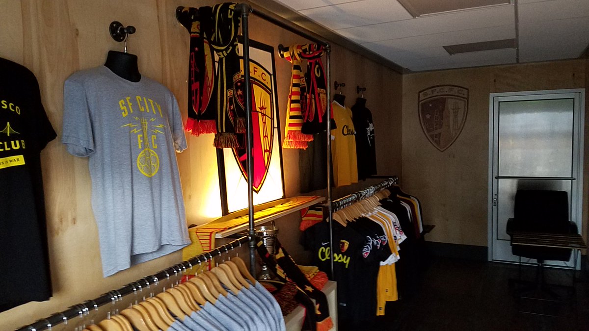 SFCityFC's tweet photo. Scarves, hoodies, sweaters, shirts and more! 
Stop by the shop or place your order online before 5:00 p.m. today. Big discounts on all in shop purchases! 
SF City members, stop by the shop today to pick up your SF City x Standard Deviant Brewing holiday sweater! https://t.co/Udcx9RkU0r