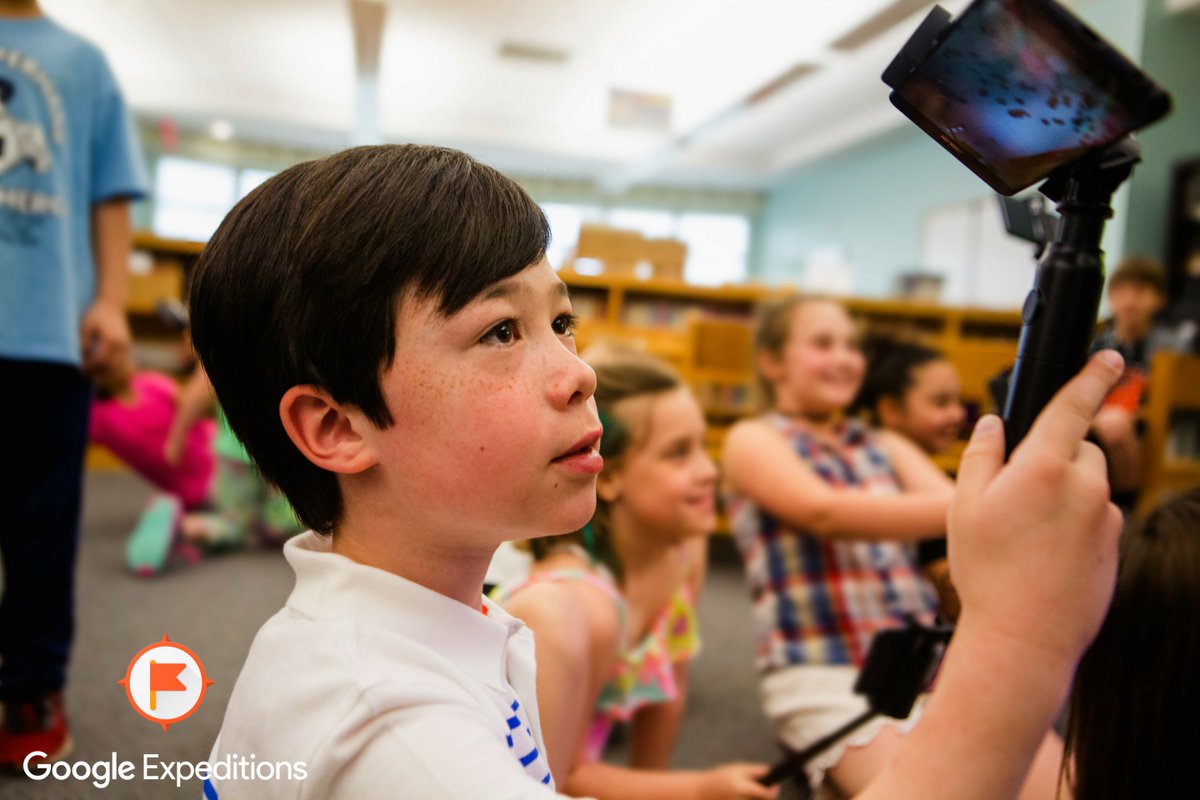 boy using augmented reality phone app