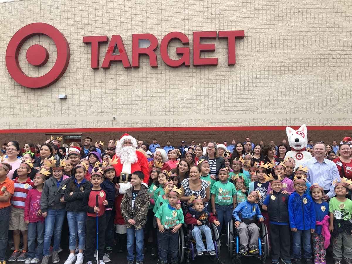 CityofMcAllen's tweet photo. Christmas came a little early this year for some @McAllenISD students. Thanks to @target, McAllen PD, McAllen Fire, @cbp and all of the amazing volunteers for making the Heroes and Helpers event a success. 
#McAllenProud https://t.co/u4swO54X5Q