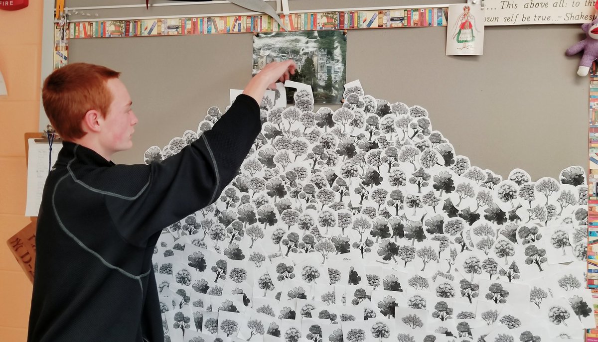 EYGoldenKnight's tweet photo. Cameron Morgan adds his trees to the advancing Birnam Wood as they close in on Dunsinane. Tomorrow, Block 3 will review Macbeth with an original competitive game entitled The Battle of Birnam Wood! #EYKnightsLearn #interactivebulletinboards #ShakespeareReview #Macbeth https://t.co/BucqgyyEQs