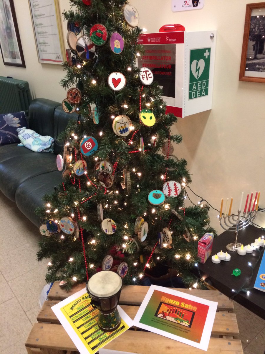 QueensvilleLC1's tweet photo. All students and staff @QueensvillePS hand painted a wooden ornament for our tree! Representing our unique and diverse backgrounds! #studentvoice @QueensvilleLC1 https://t.co/eJU0Slqqpt