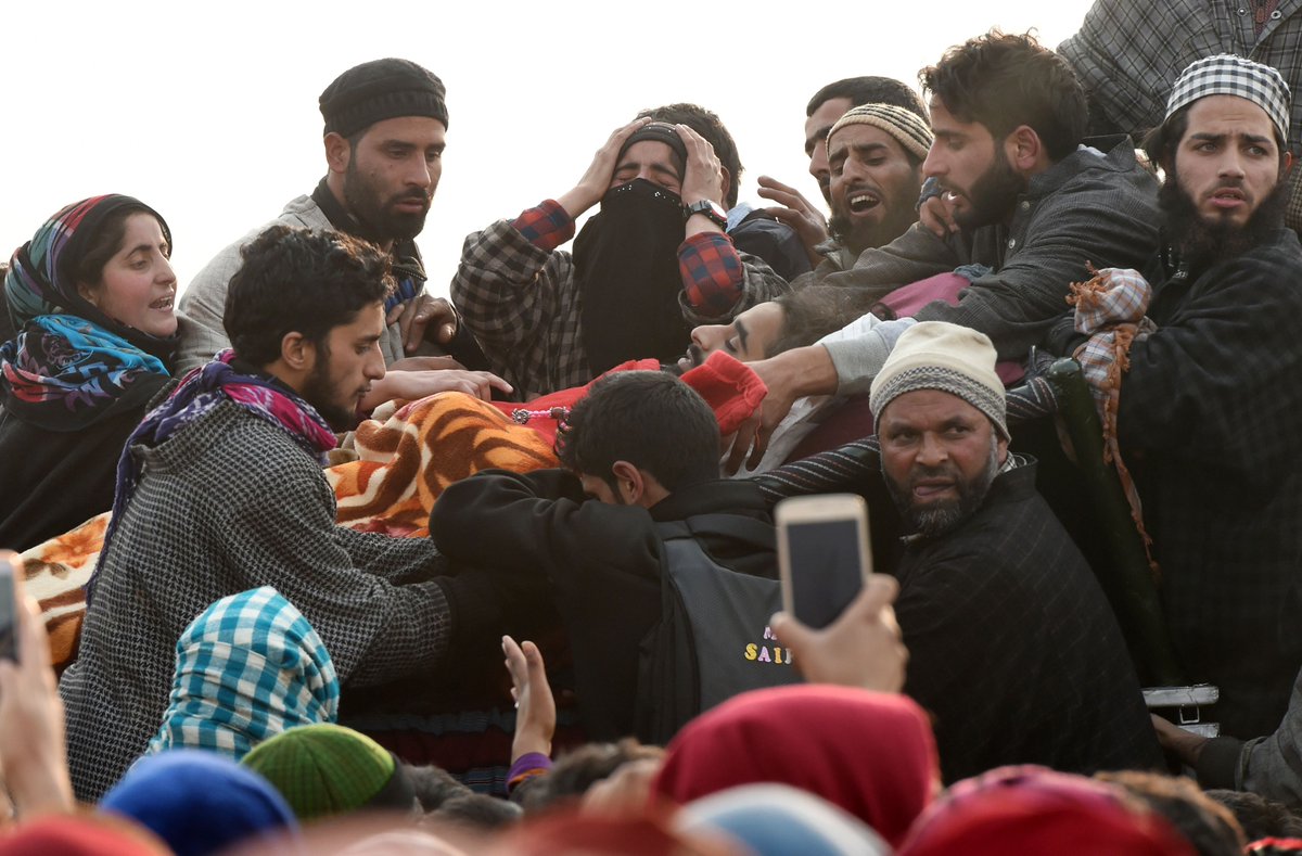PressTV's tweet photo. Mass funeral held for three #Kashmiris killed by Indian forces in Shopian district

#Kashmir #PlightOfKashmir https://t.co/EA8CtEsBIs