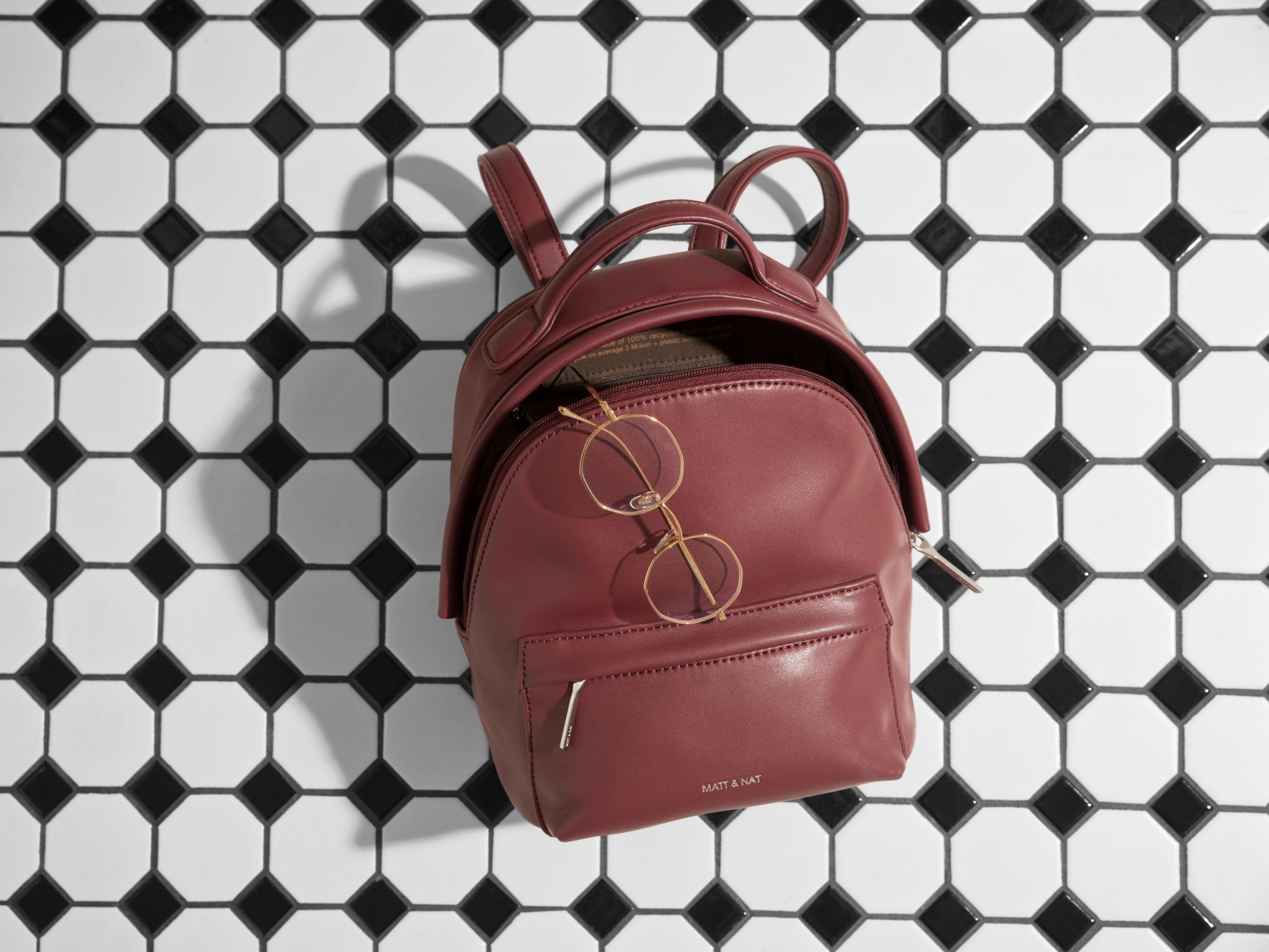 little burgundy backpack