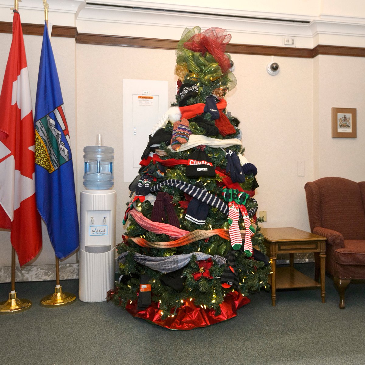 RachelNotley's tweet photo. This year, we decorated the Christmas tree in the Premier's Wing with mittens, socks, hats and scarfs. Today we visited @BoyleStreet to drop off the winter gear, and wish clients a safe & happy holiday season. #ableg https://t.co/DC7baBozqd