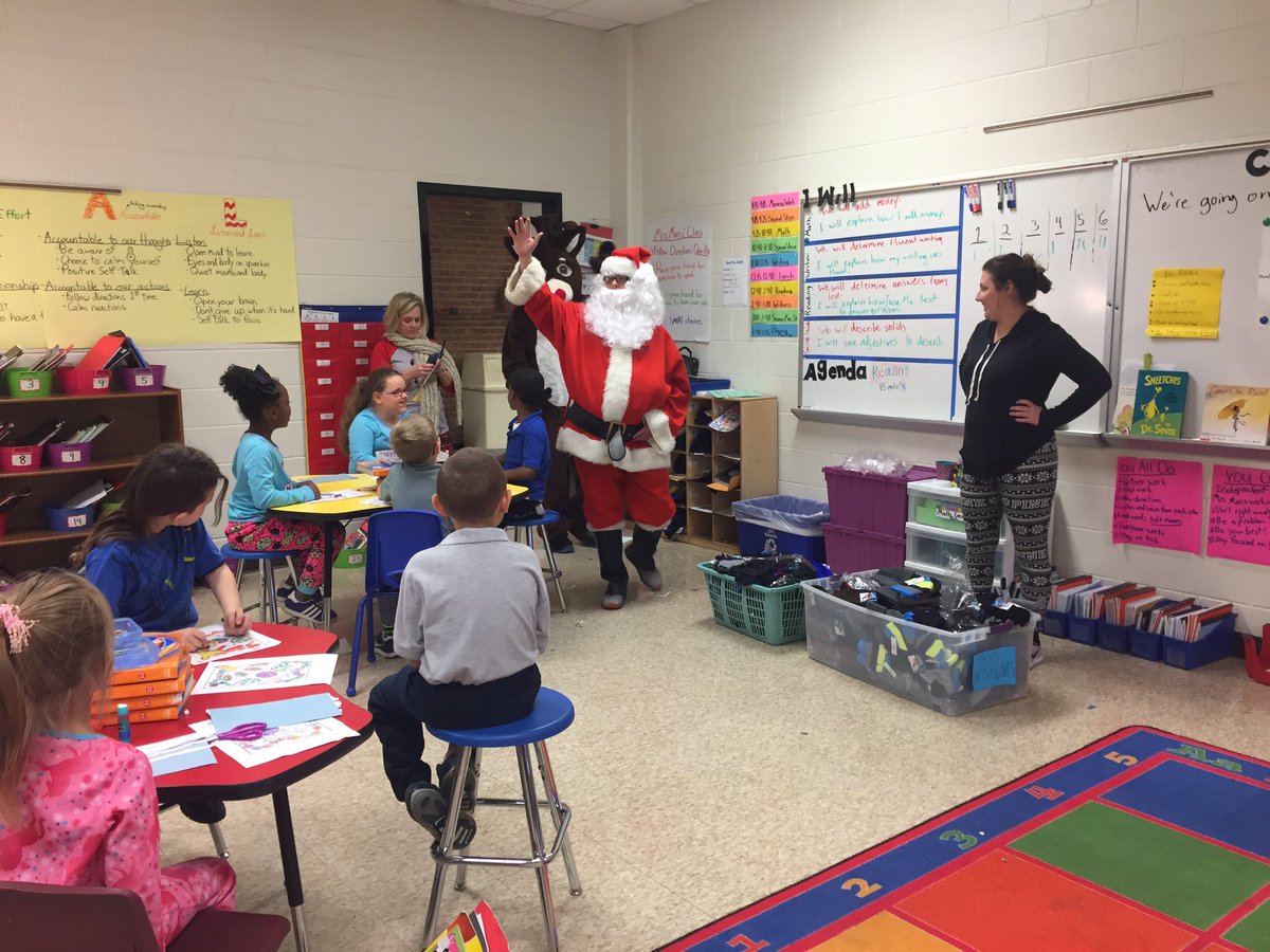 portlandjcps's tweet photo. Santa and Rudolph are here for Polar Express Day giving cookies and milk while distributing hats and gloves donated by #ElevatePortland @southeastchrist @UofLbiz @region6jcps https://t.co/OndhnlC1JD