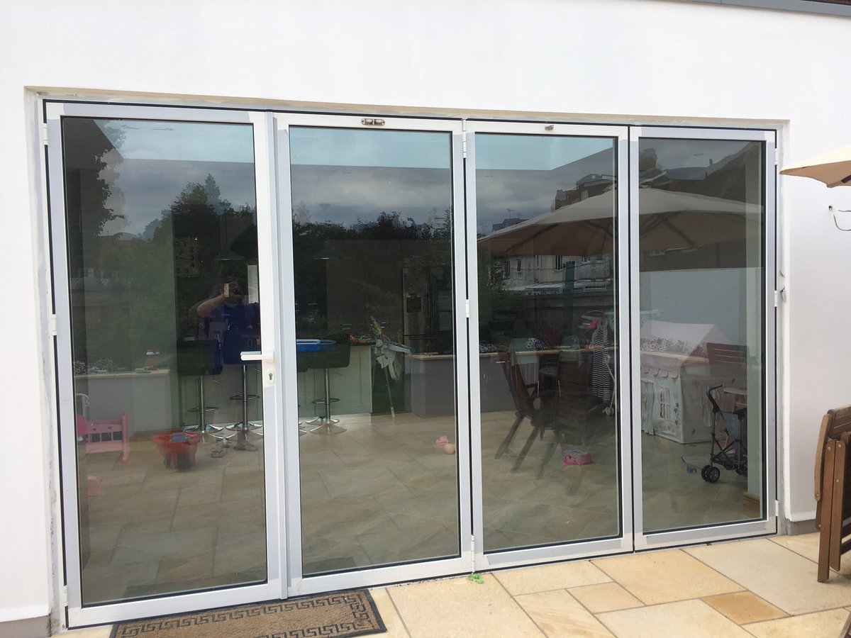 Generation3535's tweet photo. White 4 Leaf Schuco Bifolding Doors. https://t.co/cBhcdfNJiq