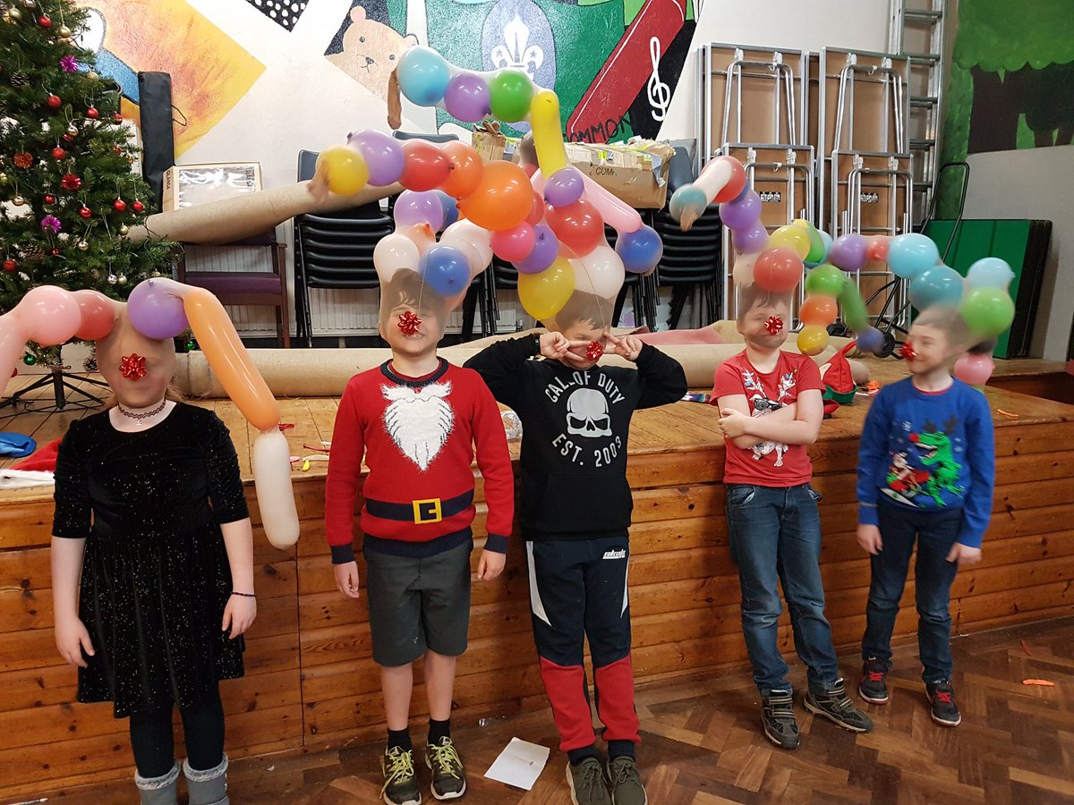 Balsall Common cubs having fun making Rudolf antlers at Christmas party.