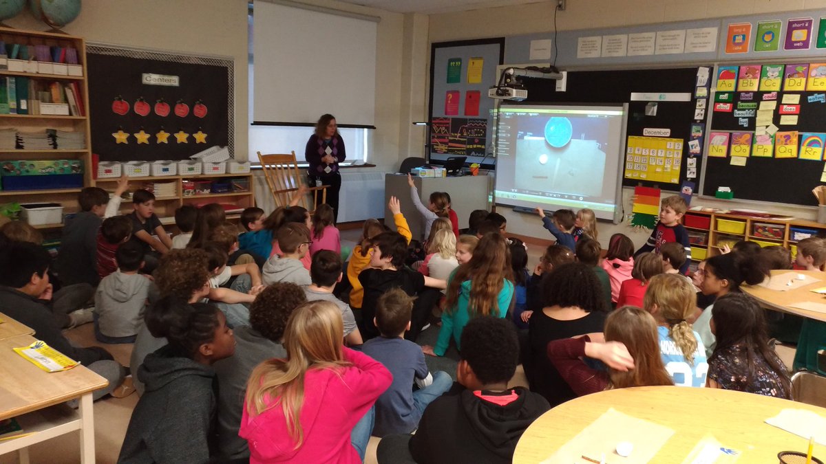MrsColvinsClass's tweet image. Ms. Rosen and the Grade Seven students taught us about Hanukkah today. We made edible dreidels! @EmmaKingES
