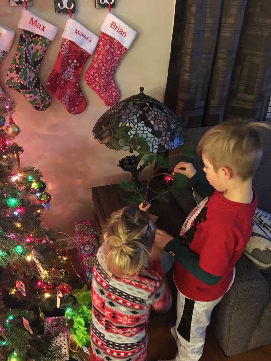 BC_NIX's tweet photo. @KAEdwards1  A couple of happy kids decorating their new tree!! #yankeeswap #dirtysanta https://t.co/FdCEk9In6x