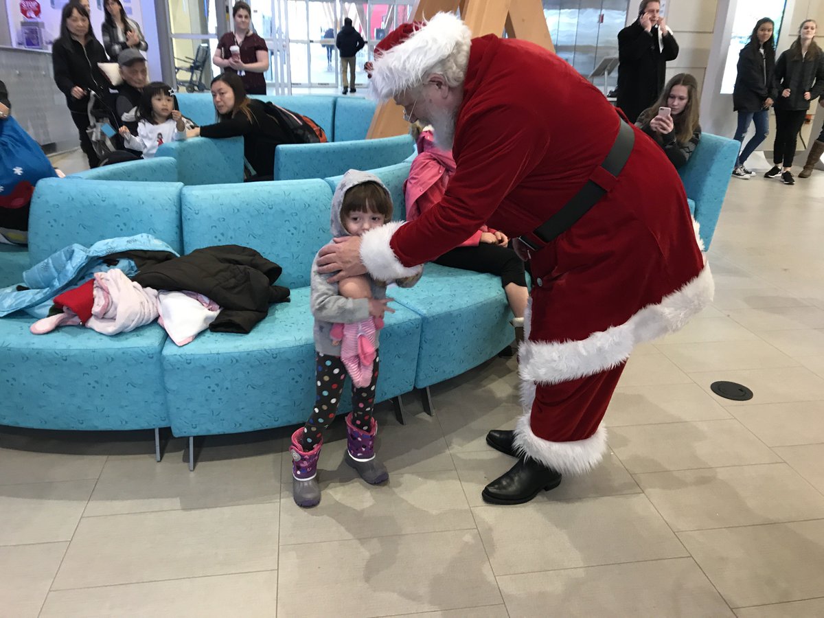 BCChildrensHosp's tweet photo. Kids @BCChildrenshosp are having a great time with #Santa and his #elves today! #SantaFlightBC @BC_EHS https://t.co/XrQO0RbFb7