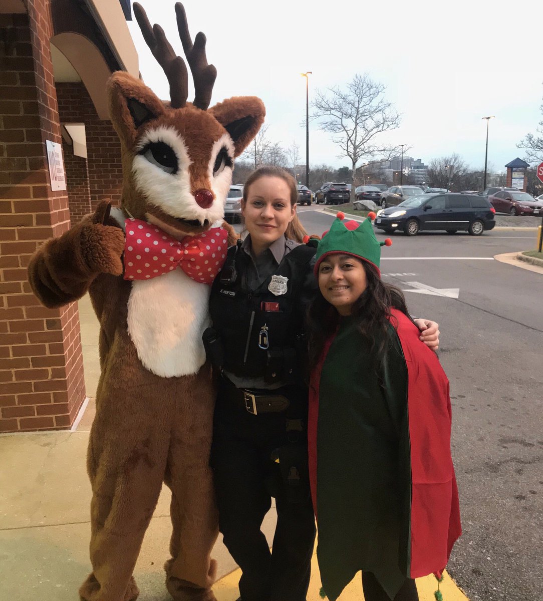 AlexandriaVAPD's tweet photo. An APD Officer never knows who she may run into around the city. Rudolph &amp; his elf were hanging out on the west end the other day! https://t.co/uHqRmq2EIJ