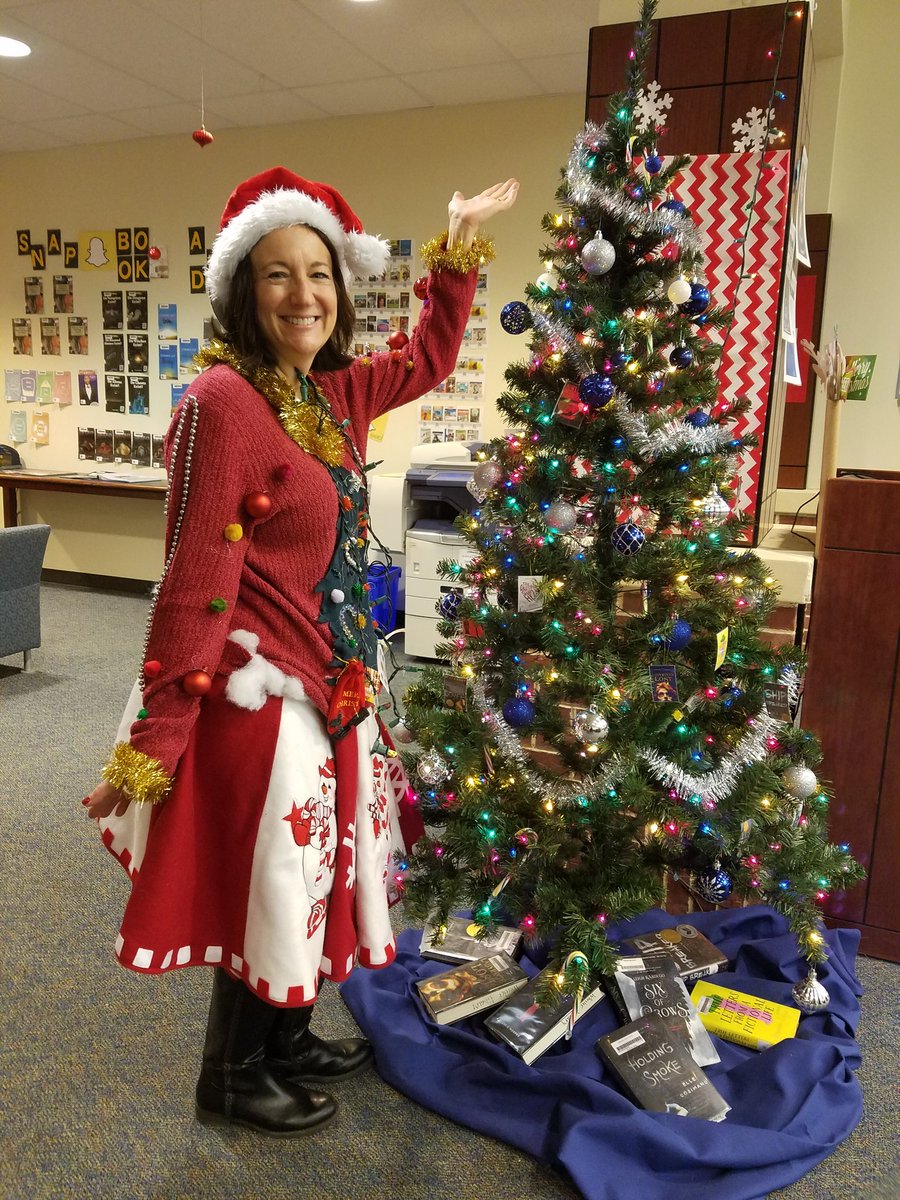 library_wheeler's tweet photo. Guess who won the ugly sweater contest? #UglySweaterDay #AwesomeParapro #CobbLMS https://t.co/sIfUlA9geb