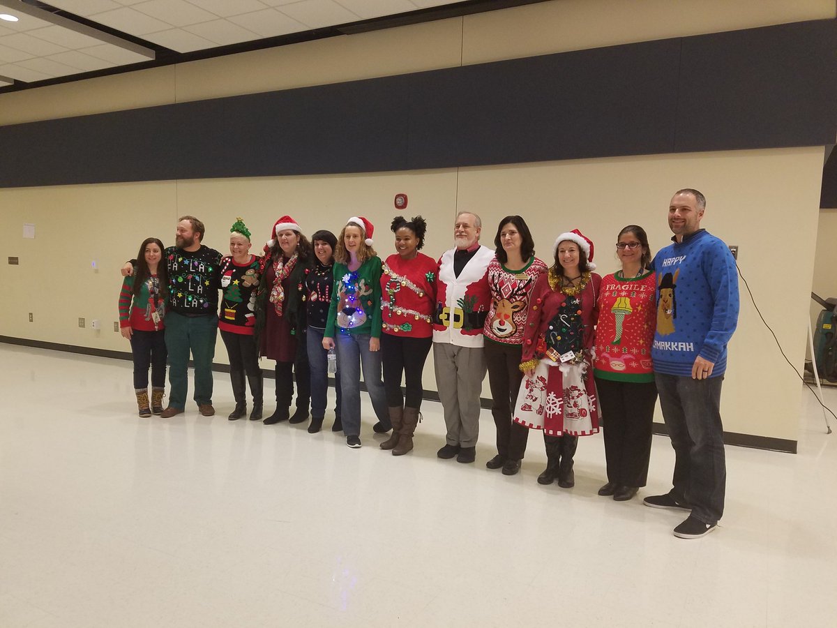 library_wheeler's tweet photo. Guess who won the ugly sweater contest? #UglySweaterDay #AwesomeParapro #CobbLMS https://t.co/sIfUlA9geb