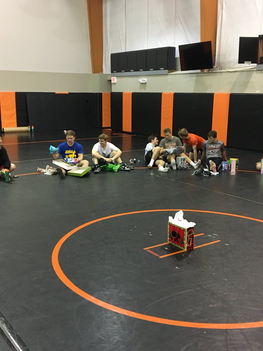 NBC_Wrestling's tweet photo. One of the most enjoyable practices of the year....Secret Santa exchange. Fun to see a team come together and share the Christmas spirit! https://t.co/XD3ZvsYtD3