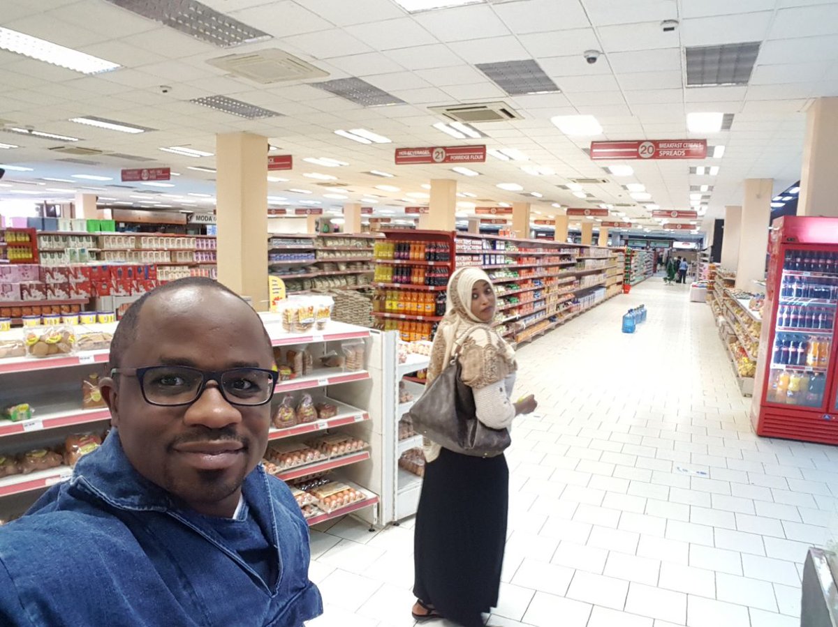 Mate_Tongola's tweet photo. Glad to see @UchumiKenya back on its feet! Sarit centre branch opens at 8am on the dot. Staff very jovial. Viva Uchumi! Cc @RamlaLulu https://t.co/FlgPSm7WqU