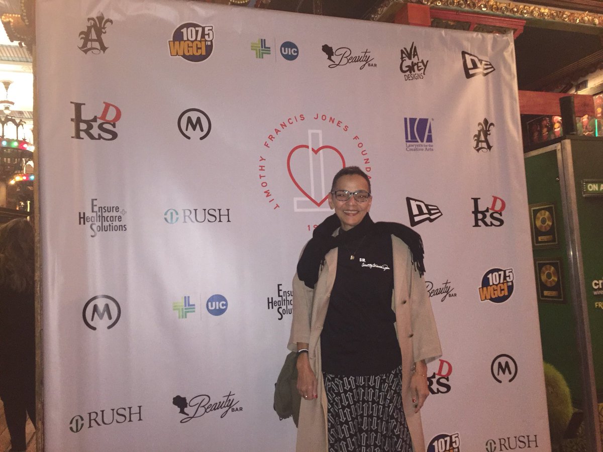 SwankPR's tweet photo. Mrs. Jones, the mother of #DJTimbuck2 posing in front of step and repeat poster at the #Timbuck2Forever event. @HOBChicago #RIPDJTimbuck2 #TFJFoundation https://t.co/ECPYPvLHwA