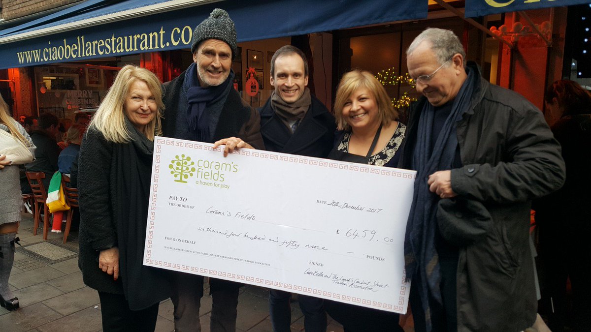 coramsfields's tweet photo. Outstanding! Ciao Bella &amp; the traders of @lambsconstWC1N have run another fantastic &amp; fabulous #christmas raffle in aid of @coramsfields, selling an amazing £6,459 of tickets for @coramsfields. Thank you! &amp; thanks also to our ambassador, Rupert Everett, for drawing the tickets. https://t.co/9cmynp4ayu