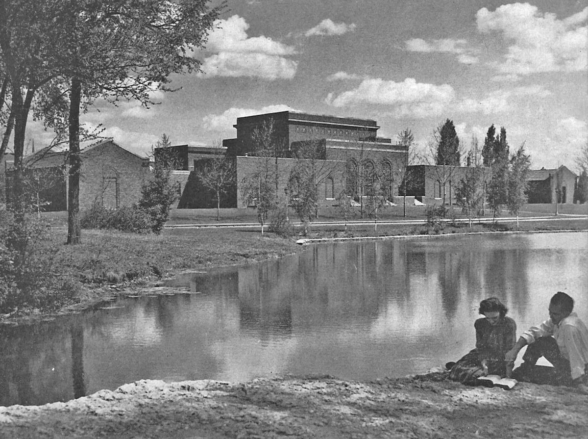 UIowaArt's tweet photo. SEASON'S GREETINGS! 
We love this early photograph from 1946 of the old art building with a young couple in foreground alongside the Hutchinson Quarry Pond. You can still sit in that exact spot and enjoy the pond.
@UIAdvancement @uiowa @UIowaCLAS 
#uiowaart #artbuildingwest https://t.co/NjPDqVSVGv