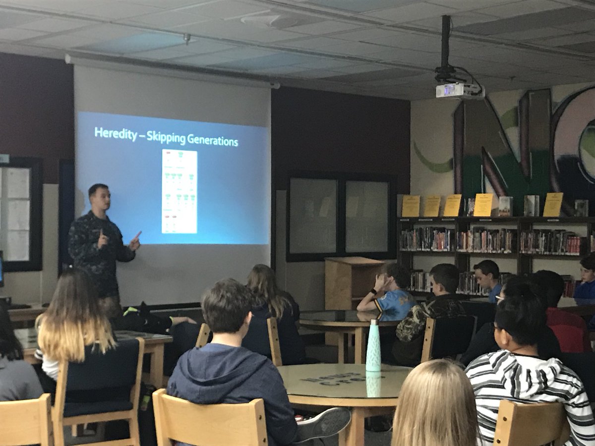 BCSD_CareerTeam's tweet photo. After finishing a unit on genetics & heredity, 7th grade science classes @ MNM had a special presentation from Biomedical/Nuclear Engineer, Ensign Donnelly of @JBCharleston. He spoke In-depth about genetics, inheritance, & biomedical research.@bcsdschools #geneticsiscool #science https://t.co/0PGm8iphvV