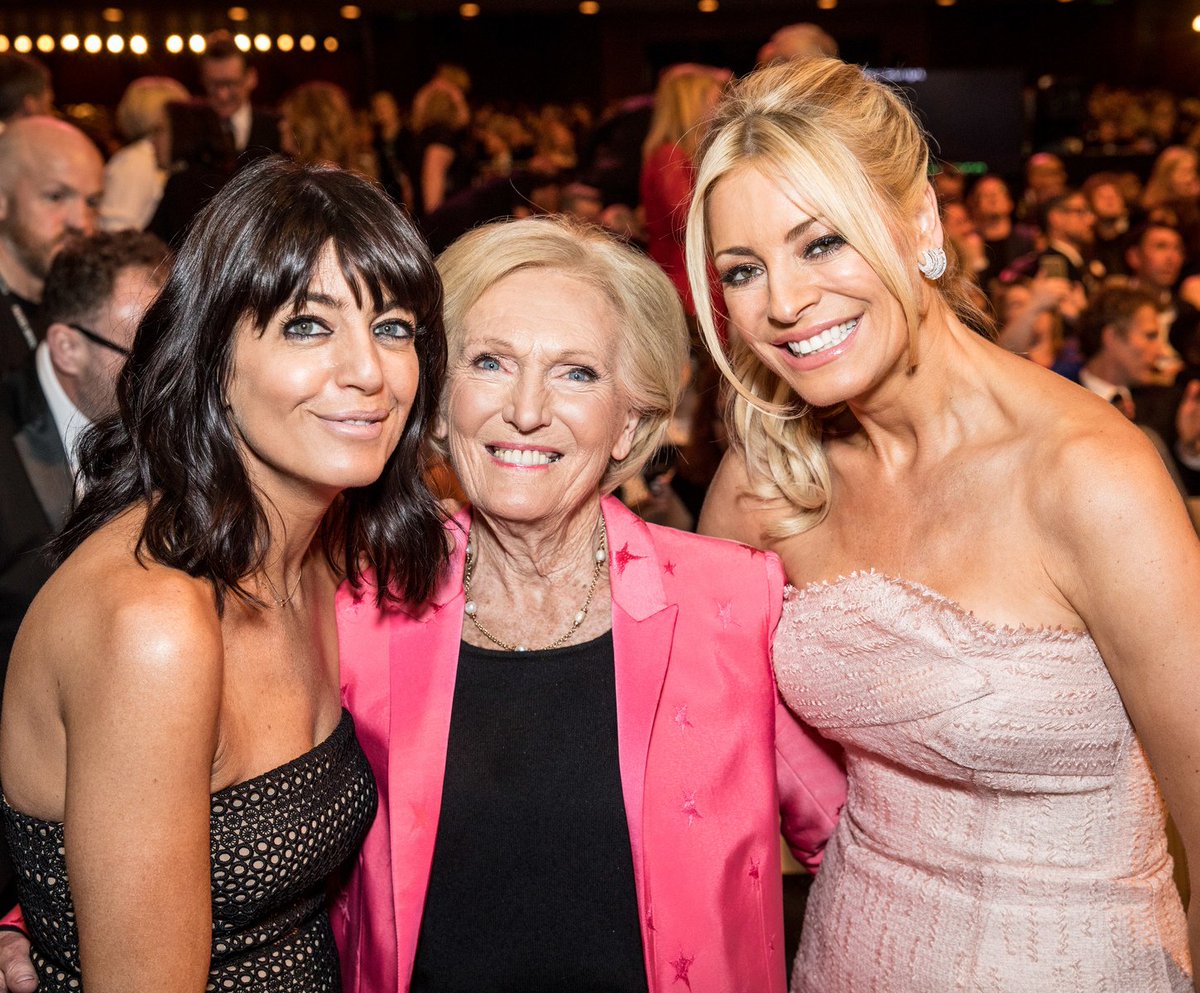 BAFTA's tweet photo. There's a crossover in here somewhere... 🍰💃 the supreme Mary Berry meets @TessDaly and @ClaudiaWinkle at our #BAFTA70 Television Awards! https://t.co/Rw5V1Gb5zX
