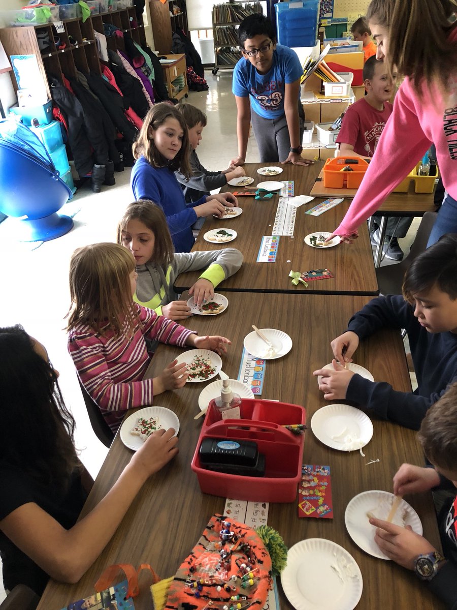 Faase608's tweet photo. Today we met with our kindergarten buddies. We read the book The Gingerbread Baby then decorated our own Christmas cookies. The 6th graders also made their buddies their own book marks! @MrsAustinKinder https://t.co/5xT7RX3X4y