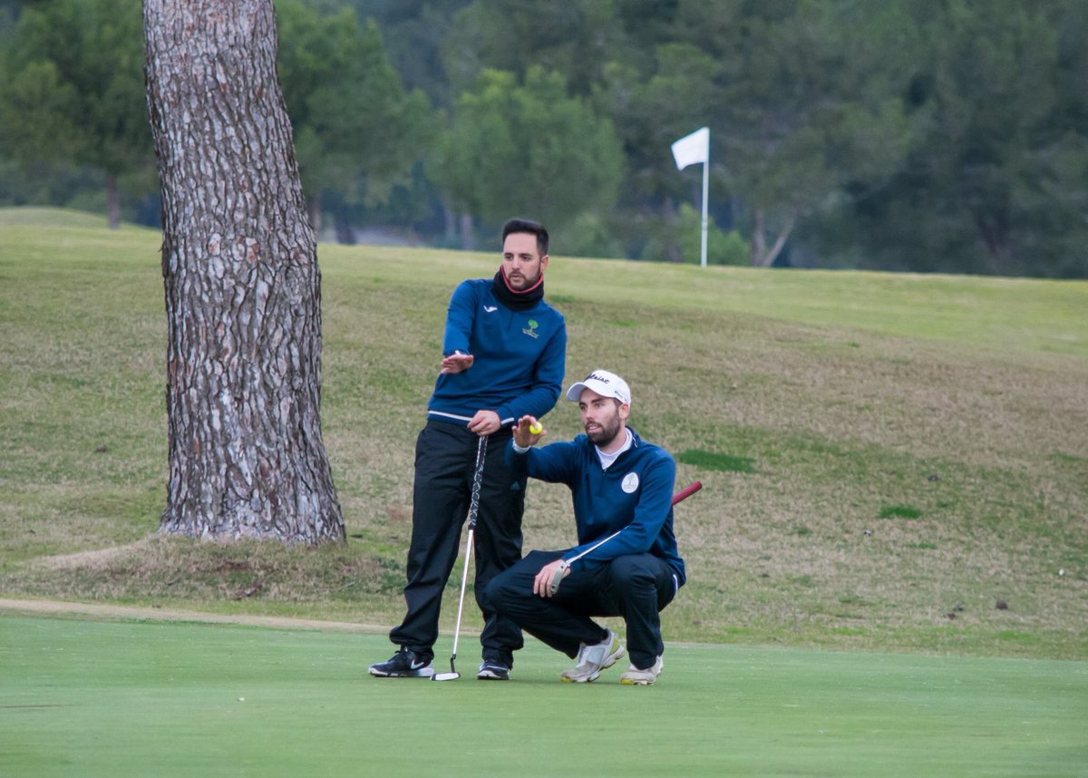 GolfPhotograph's tweet photo. INVINCIBLE ! Nico Loprete &amp; Joan Gonzalez Camarero-Nuñez discussing their last putt, which would lead them to win the Campeonato de Baleares Dobles de Profesionales for the 4th time in a row! https://t.co/szLNpFZfkD