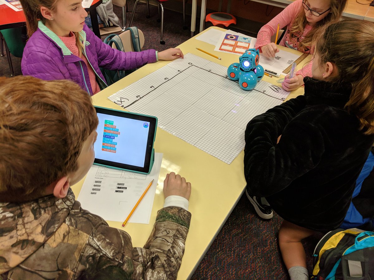 RootITF's tweet image. Fifth grade students at Root using Dash Robots to test their understanding of The Coordinate System (#math5.G.1) through Blockly programming to create coordinate courses and challenging other students to guess their course paths (#math5.G.2) @stemrootelem @RootElem @STEM_WCPSS