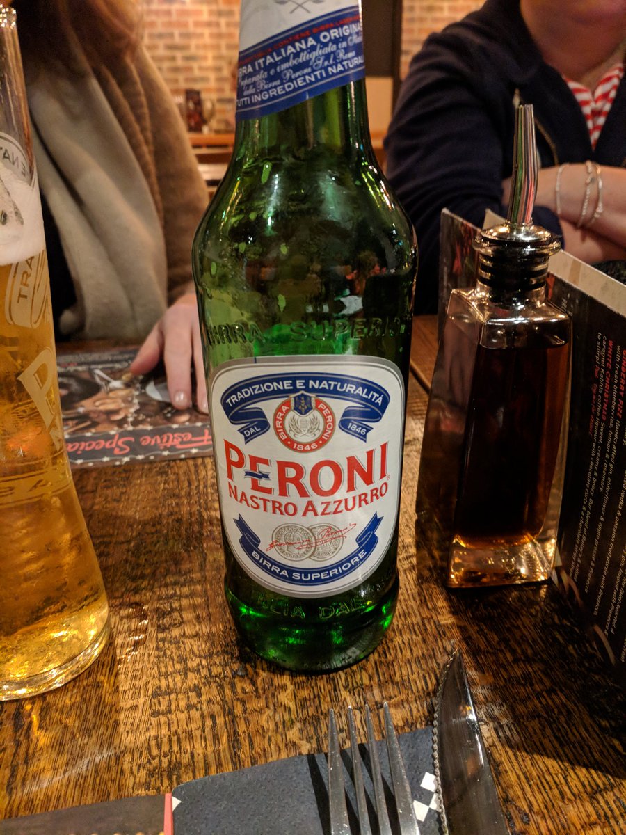 Enjoying a Peroni <a href="/WeAreZizzi/">Zizzi</a>