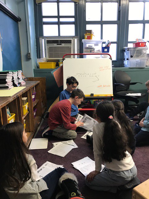 PS452NYC's tweet photo. Inside PS 452: A wonderful example of the collaborative student work happening in 3rd grade! Two students teach a small group how to revise their imaginative writing task in social studies using their rubrics. #inside452#kidsteachingkids https://t.co/k6H1GpDwnt