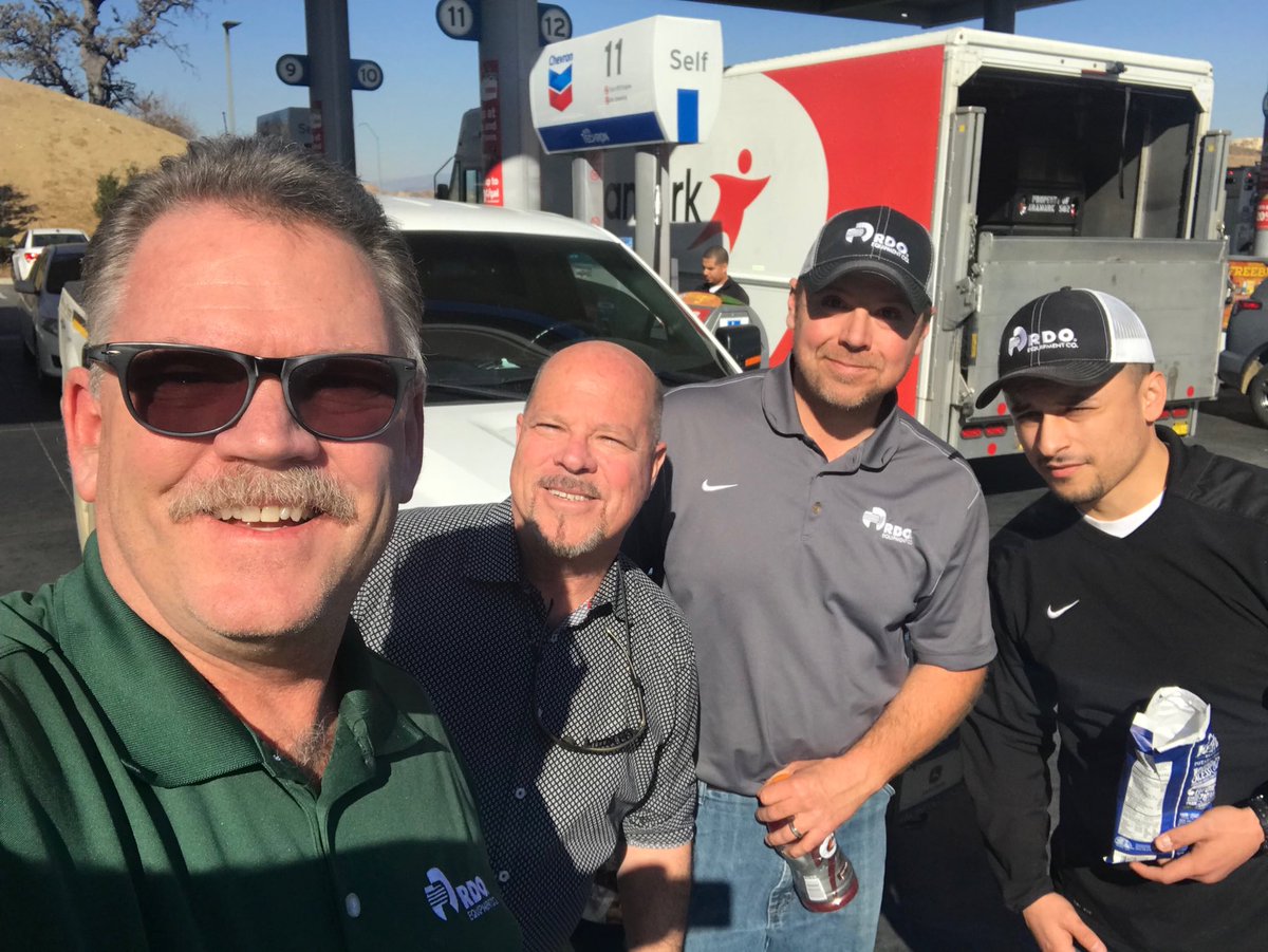 RDOKenH's tweet photo. Mark Rehbein and I working accounts in SoCA. Stopped for fuel &amp; bumped into Jay Garcia and Chip Lembcke from Pasco , WA at the Chevron in Valencia, CA! It put a big smile on all our faces to see each other. We had never met before, but the RDO branded hats and truck gave it away! https://t.co/YhqW939ZZu