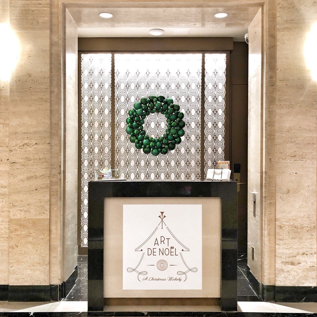 SofitelDC's tweet photo. ‘Tis the season of sparkles! A wreath of boule de Noël greets you in our lobby #artdenoel #sofiteldc #feelwelcome https://t.co/m6liHEkVNA