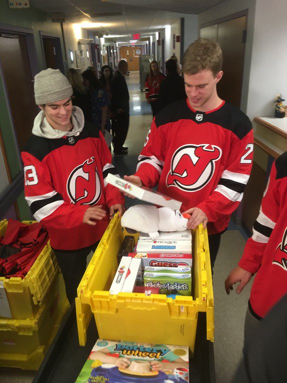 nicohischier's tweet photo. Had a great time visiting kids at Saint Barnabas Medical Center. Thank you for having us. Happy holidays! #DevilsCare https://t.co/HVHWJRYDWB