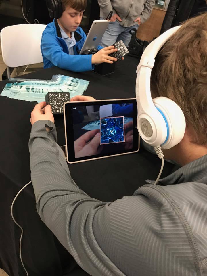 Mighty_Coconut's tweet photo. Huge Thanks to @VRAustin and @MergeVR for a great #VR #AR Holiday party last night. It was so fun showing off our new game #57degreesNorth @CapitalFactory. We go LIVE tomorrow, 12/21/17! Download for only $2.99, on iOS and Android. #mergecube #techtoys #cooltoys #mightycoconut https://t.co/YwHCglFa3u