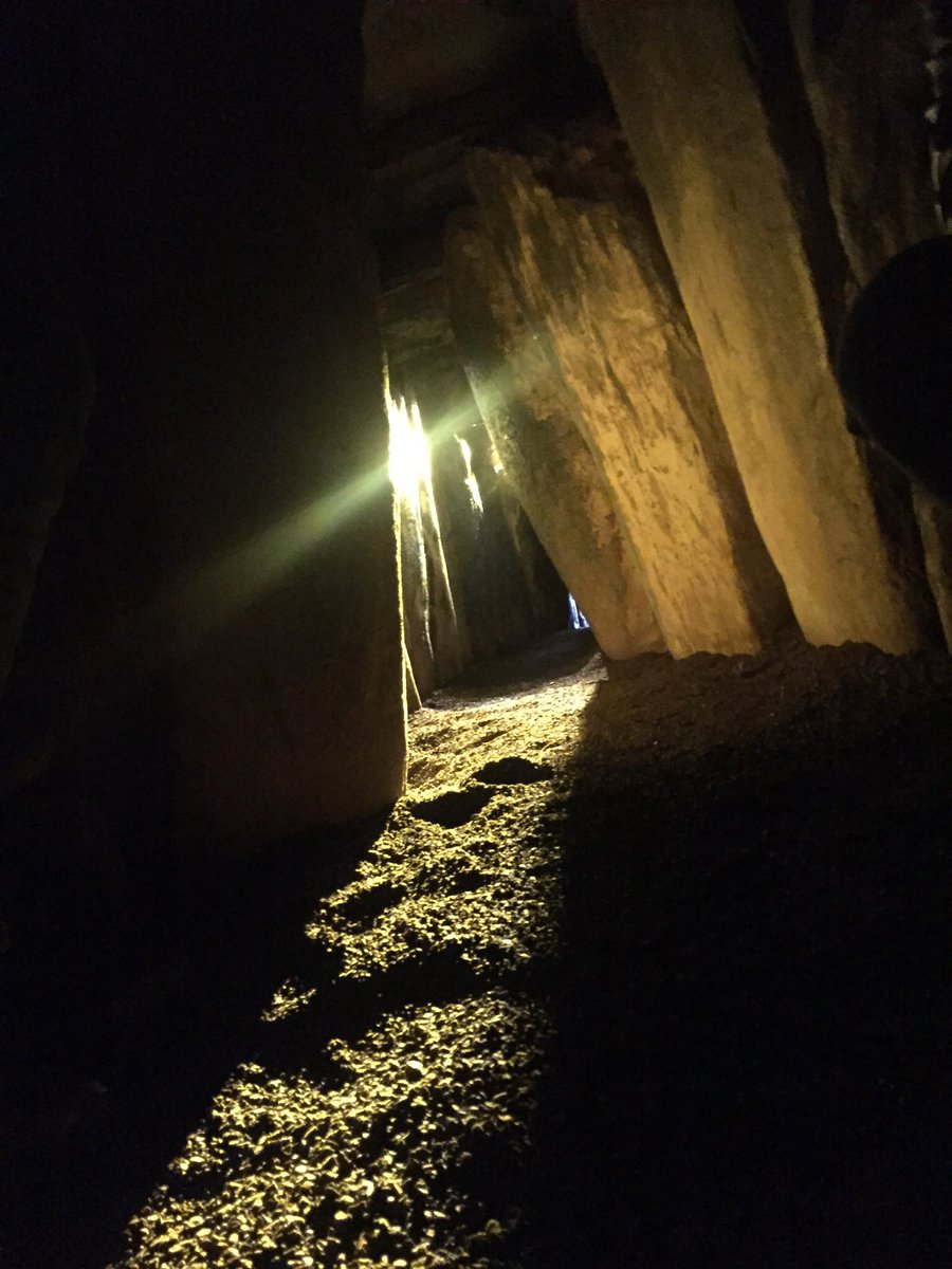 MarkLangtry's tweet photo. Amazing atmosphere and sense of awe and wonder at #Newgrange @ancienteastIRL as the sun creeps up the inner passage of the 5,000 year old passage tomb, on the shortest day of the year, marking the earths tilt back towards the sun for longer days #WinterSolstice2017 https://t.co/sfGa9ASqsh