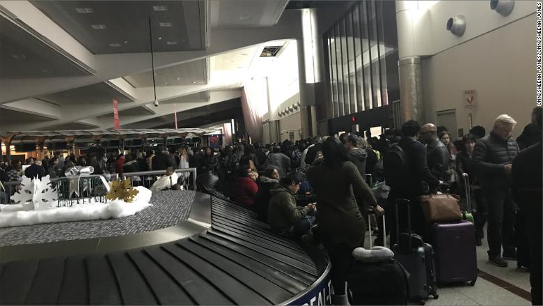 CNN's tweet photo. The big power outage at the Atlanta airport cost Delta as much as $50 million -- and the CEO wants the money back https://t.co/BsDt2hi0ya https://t.co/vpwrJJmsZm