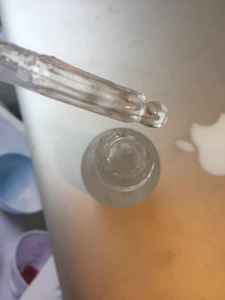 MaplesLass's tweet photo. @deciem I have shaken it for longer than 30 seconds and it still looks as funny as this. The squeeze tube won’t collect any inside because it is too thick and the liquid lines the sides of the bottle. Are you sure it hasn’t gone off? I don’t know how I’m going to get the primer out? https://t.co/7xyCGq7MuZ