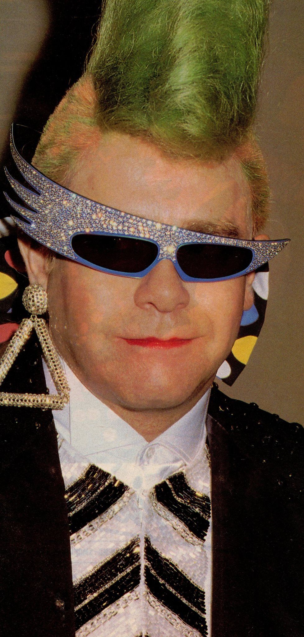 alain mikli on X: "Rock Star // Elton John wears the feathered plume frame  customized with Swarovski crystals circa 1987. https://t.co/u88Xw3IjKR" / X