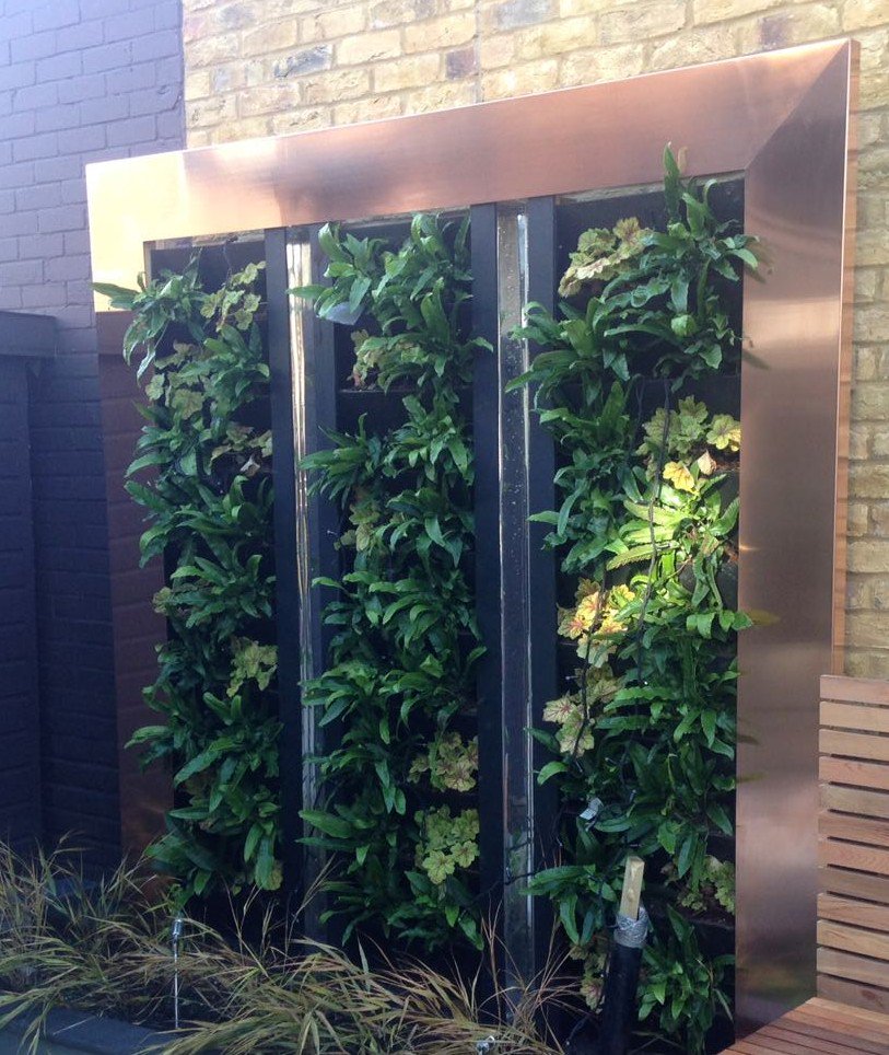 Copper frame has just been installed setting off our <a href="/verticalgrowers/">Treebox Ltd</a> green walls and mirrors #landscaping #architecture #homeimprovement #design