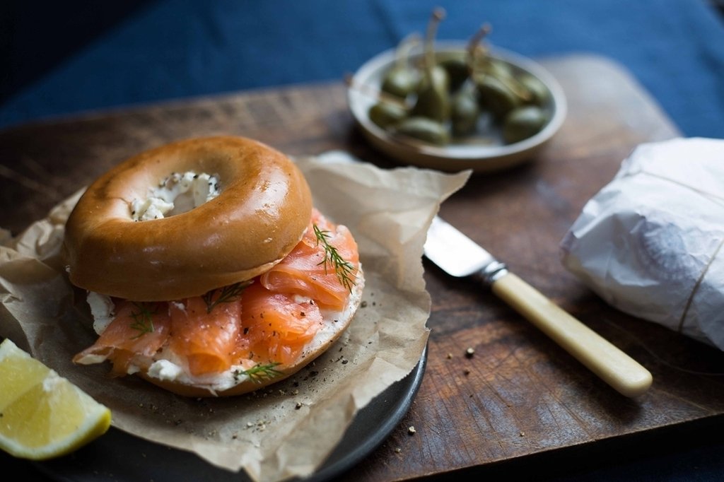 NYBakeryCo's tweet photo. In need of some festive brunch inspiration? @jadesarkhel has created this delicious NYB bagel with smoked salmon and @philadelphiacreamcheese. There's nothing more magical than bagels, cream cheese and lox. https://t.co/4cbXWnUSS4 https://t.co/oZeh039aDi