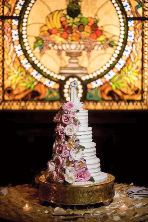 PartyFlavors's tweet photo. We are loving how this 4-tiered cake with cascading flowers complements the stained glass windows at The Ballroom on Church Street so perfectly! Thank you @@cricketsphoto for the gorgeous picture. #weddinginspo https://t.co/AmgLyOFRvT
