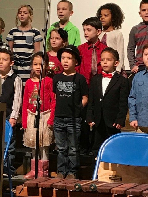 meadschools's tweet photo. Check out the pictures from last Friday's Colbert Holiday Concert. Love the suit selected for the occasion by music teacher Drew Olsen! #LearnLeadMead https://t.co/b8F3MYiI0x