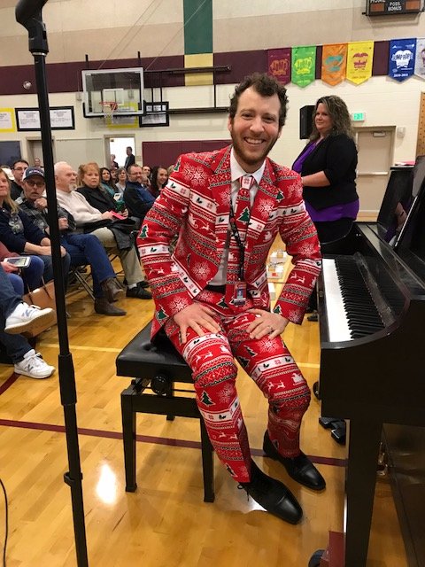 meadschools's tweet photo. Check out the pictures from last Friday's Colbert Holiday Concert. Love the suit selected for the occasion by music teacher Drew Olsen! #LearnLeadMead https://t.co/b8F3MYiI0x