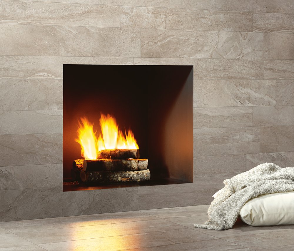 We're celebrating the first day of winter with our favorite fireplace room scene. Our cozy fireplace is covered with Scene in Horizon. #winter #fireplace americanolean.com/series.cfm?ser…
